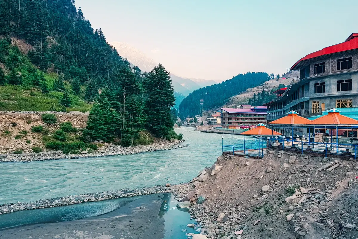 Kalam town and the Swat river surrounded by forested slopes, upper Swat