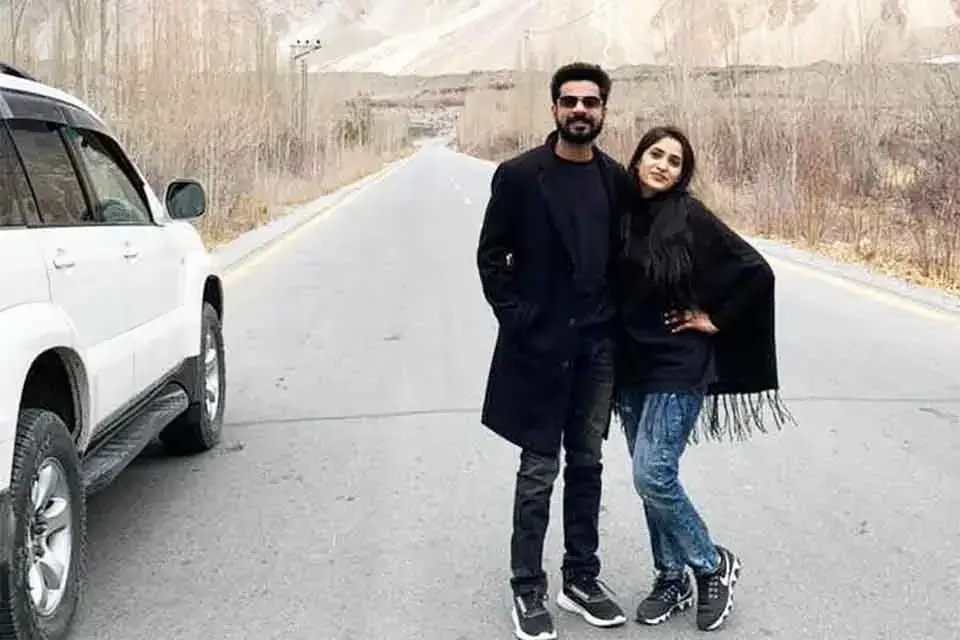 Couple at Khunjerab Pass on a Hunza trip