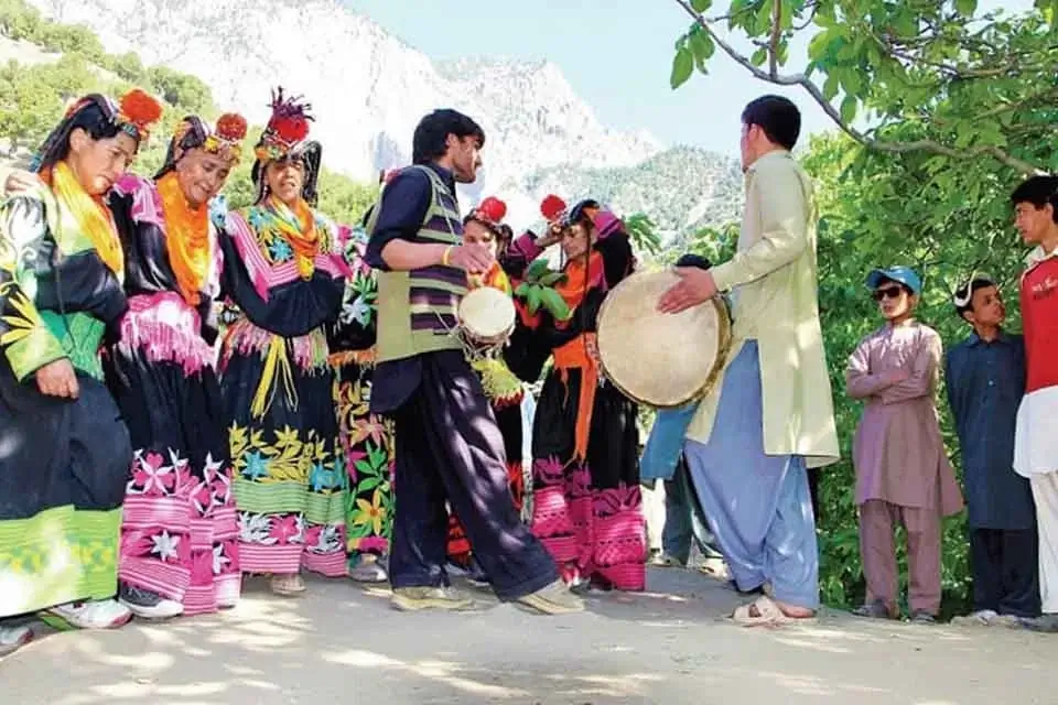 People enjoying the Kalash spring festival