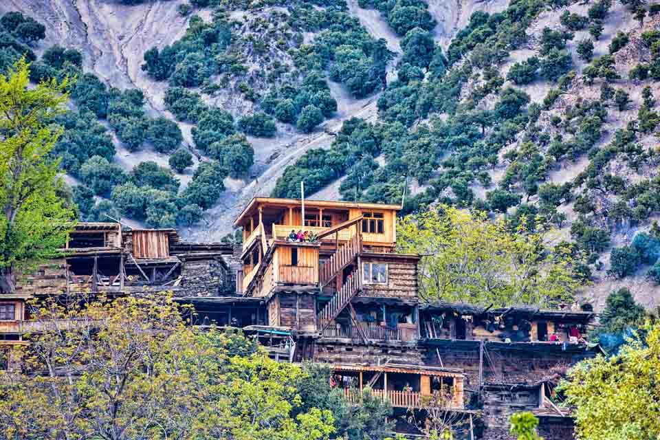 Traditional Kalasha wooden houses in Rumbur valley, Chitral