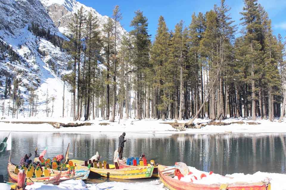 Mahodand Lake with pine forest and mountains behind, upper Swat Valley